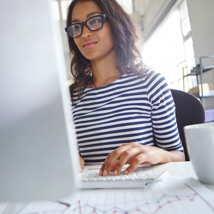 Woman Viewing Desktop Computer