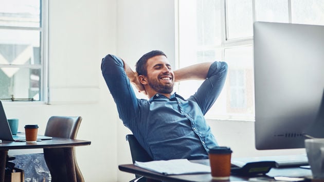 Man Smiling At Computer 
