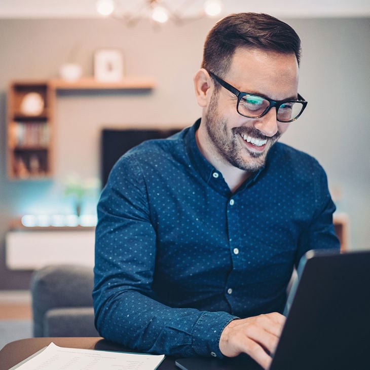 Man Working On Laptop 