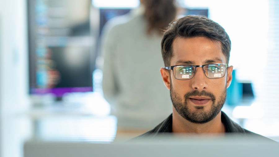 professional-reviewing-data-on-screen