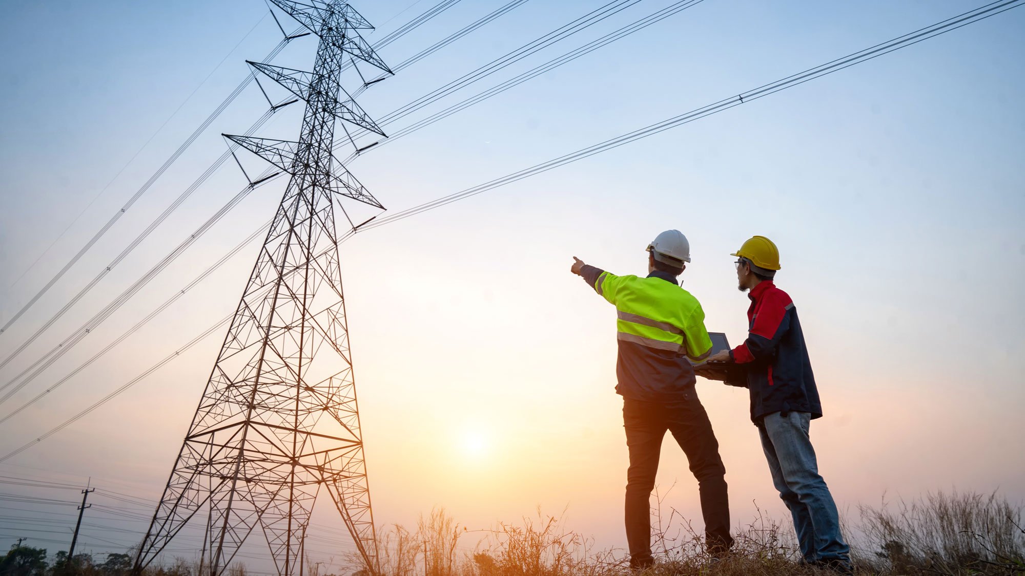 two-engineers-reviewing-powerlines