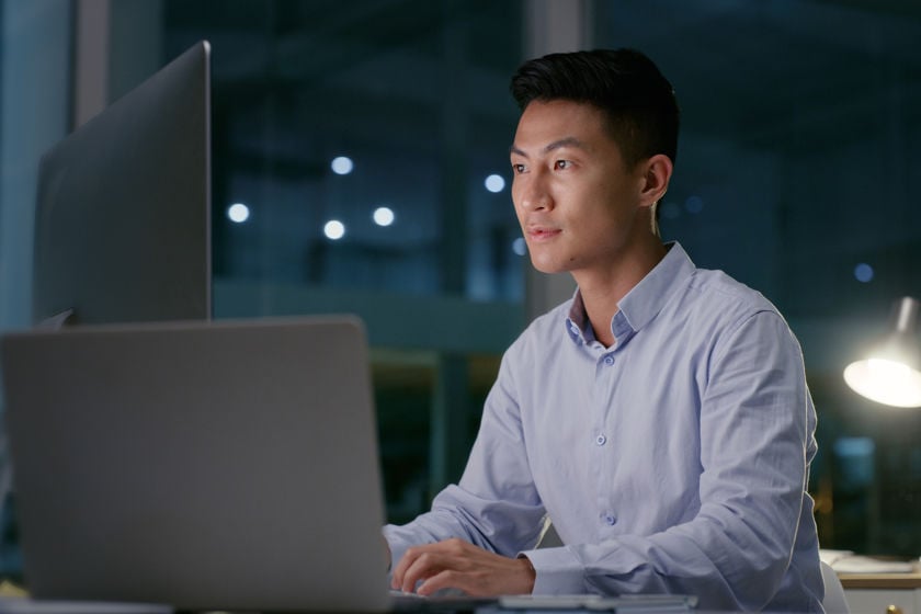 Man Looking At Computer Night 