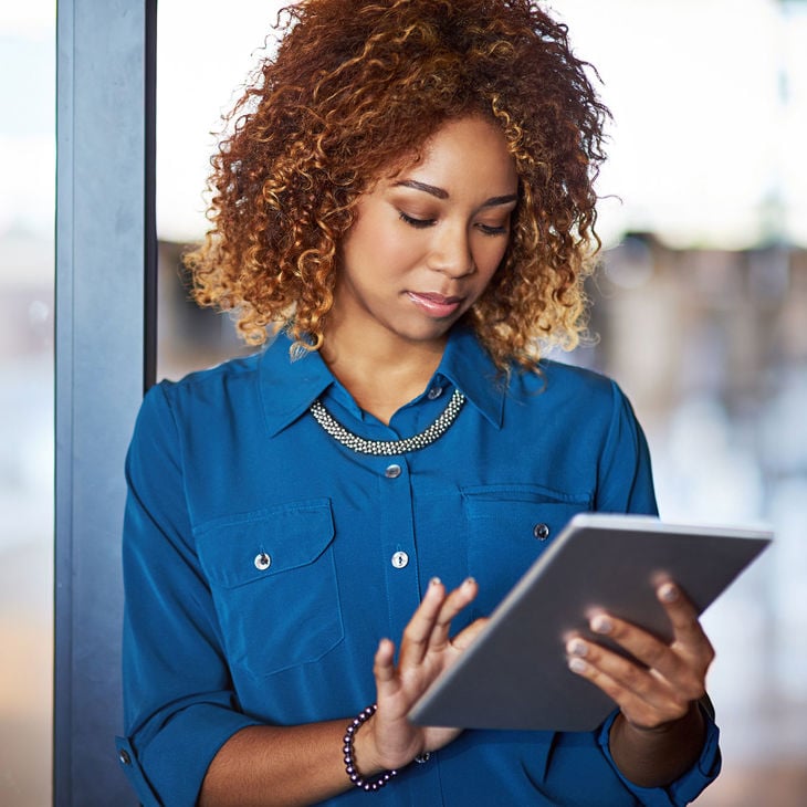 Woman Working On Ipad