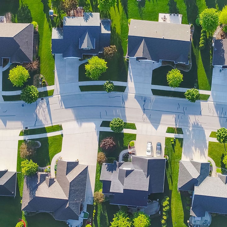 Aerial View Of Street In Residential Development 