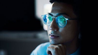 Screen Data Reflecting On Persons Glasses 