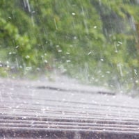 Close Up Of Hail Coming Down On Roof 