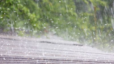 Close Up Of Hail Coming Down On Roof 