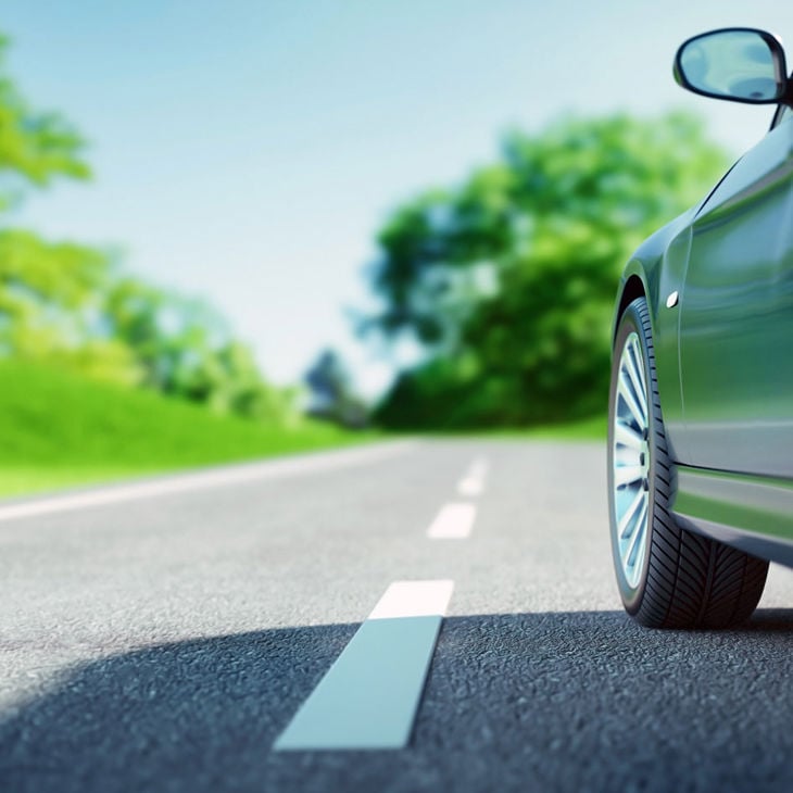Car Driving Down Road