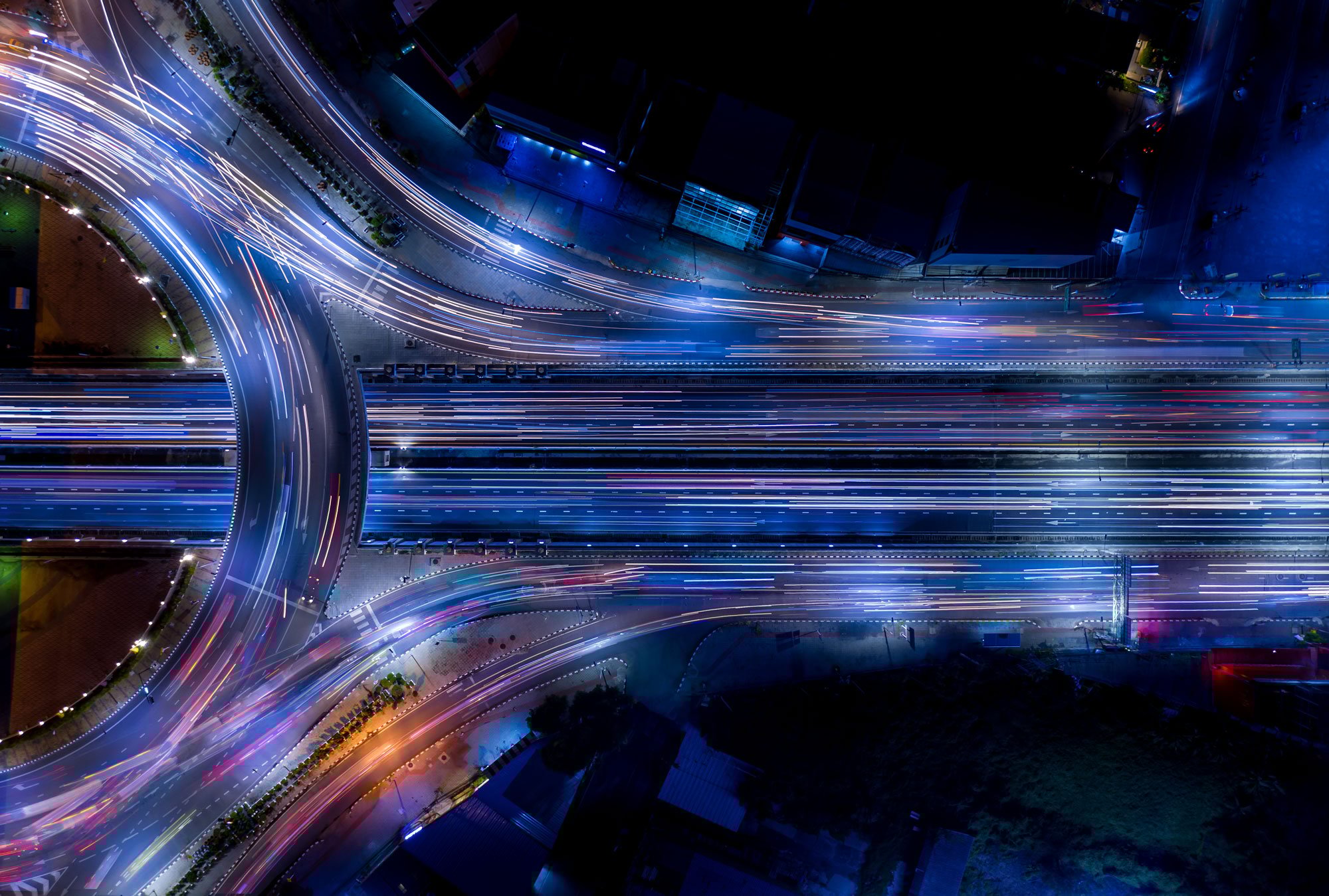 Aerial Time Lapse Photo Of Cars Driving At Night 