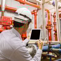 Inspecting Plumbing In Commercial Building 