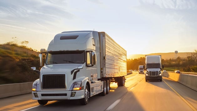 Commercial Trucks On Highway 