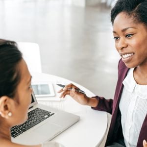 Women Speaking In The Office 