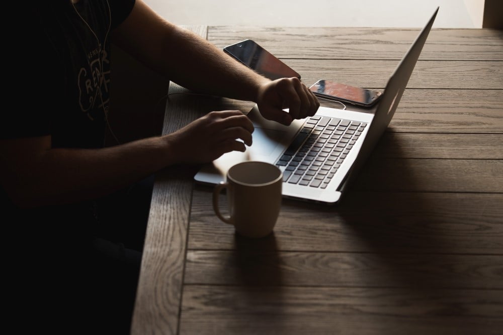 man working on laptop