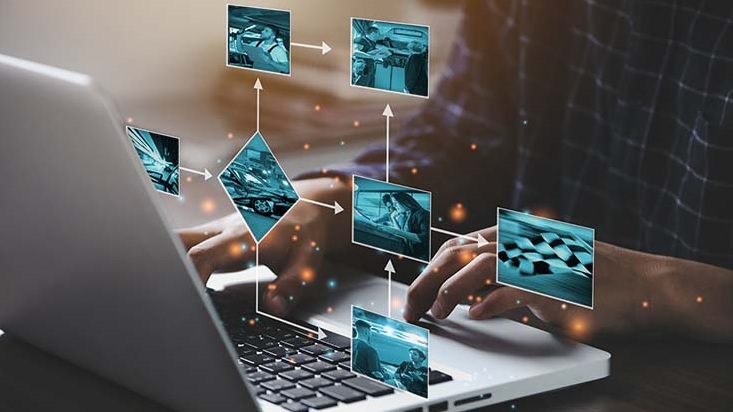 person typing on a laptop 