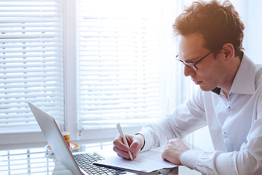 Man Filling Out Application 