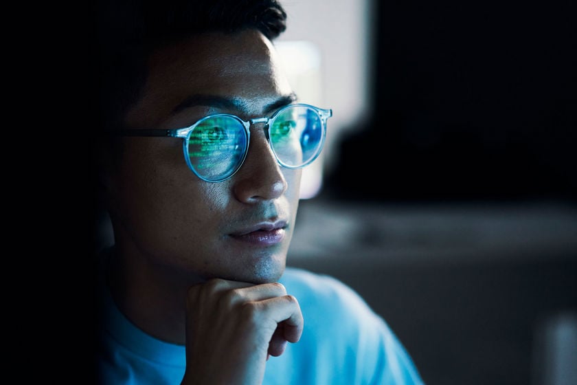 Person Reviewing Data On Screen 