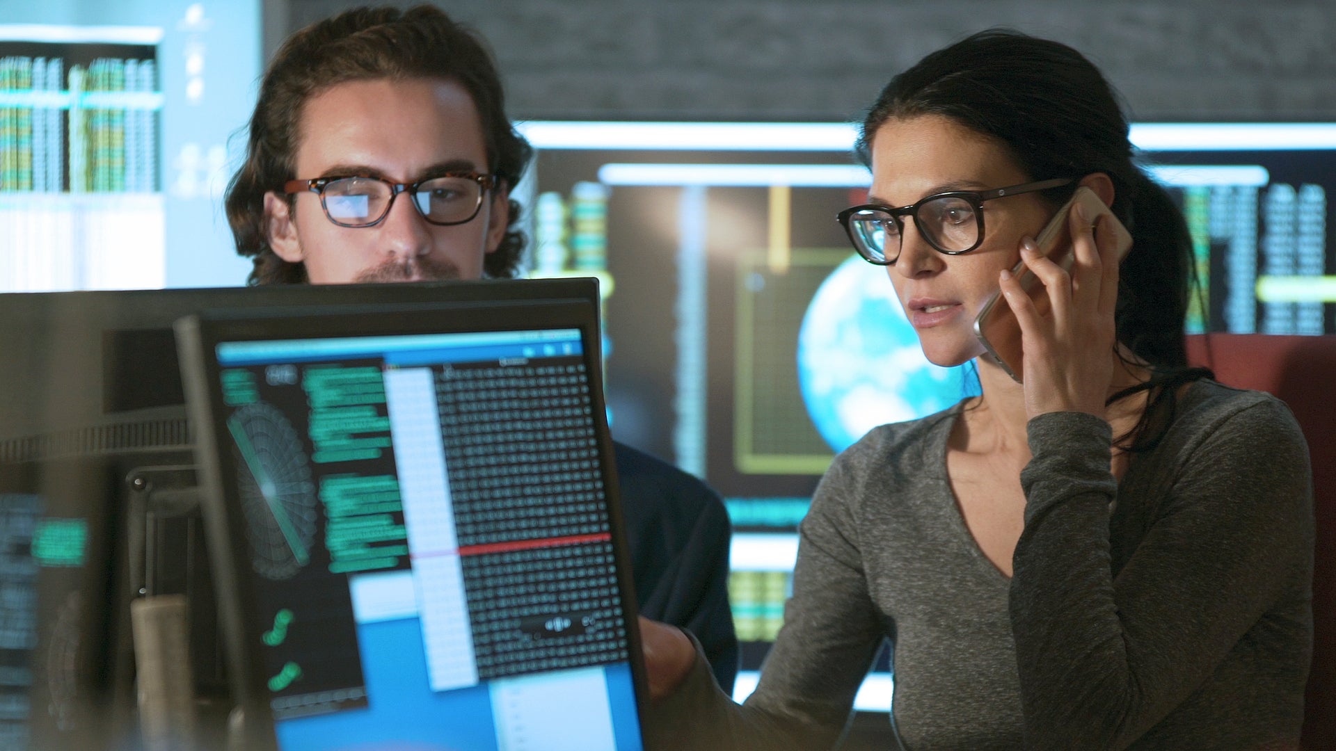 coworkers analyzing data