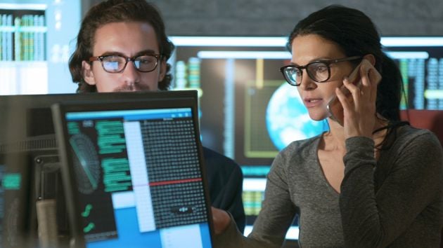 Coworkers Analyzing Data 