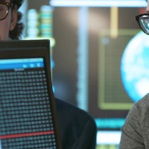 Coworkers Analyzing Data 