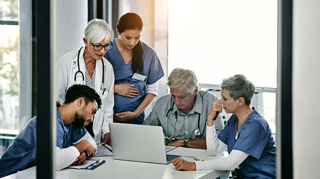 Doctors In A Meeting 
