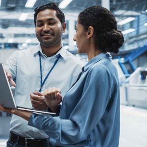 Coworkers Reviewing Work Together 
