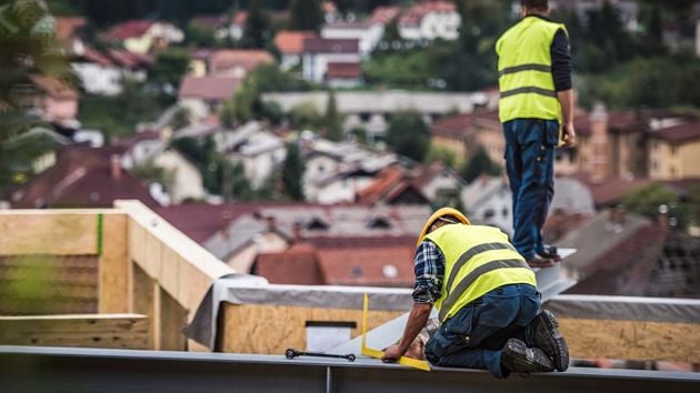 Construction Workers On Building 