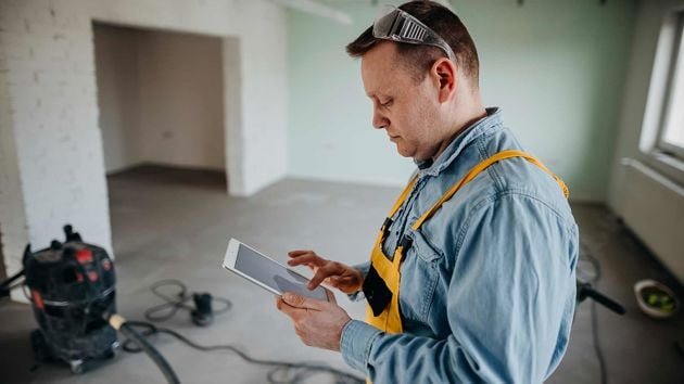 Worker Using Tablet 