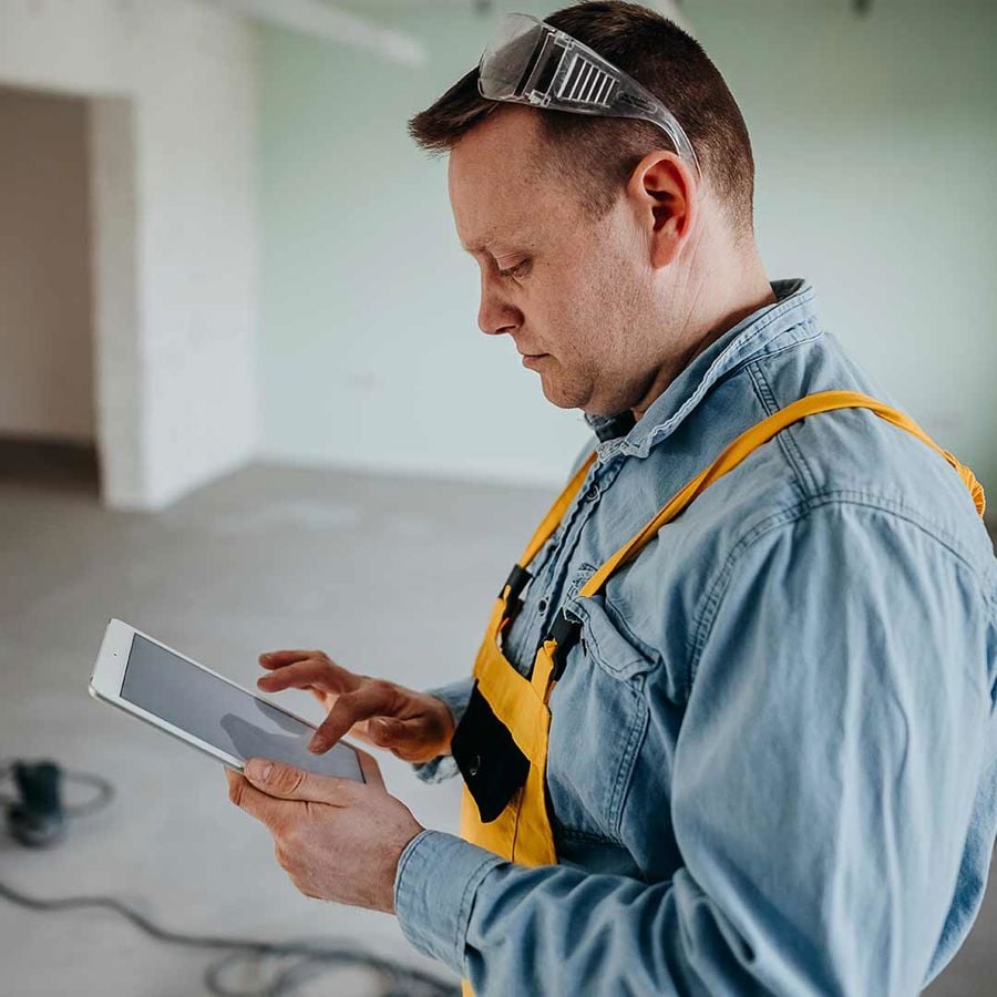 Worker Using Tablet 