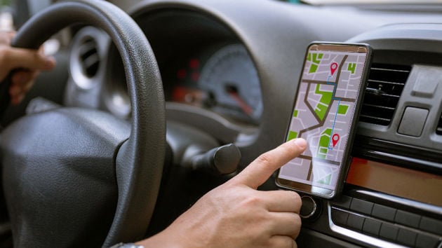 Verisk Coverage Verifier Analytic Objects Hand Pointing At Phone Gps In Car