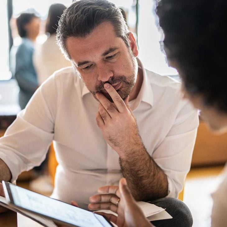 Man Reviewing Work 