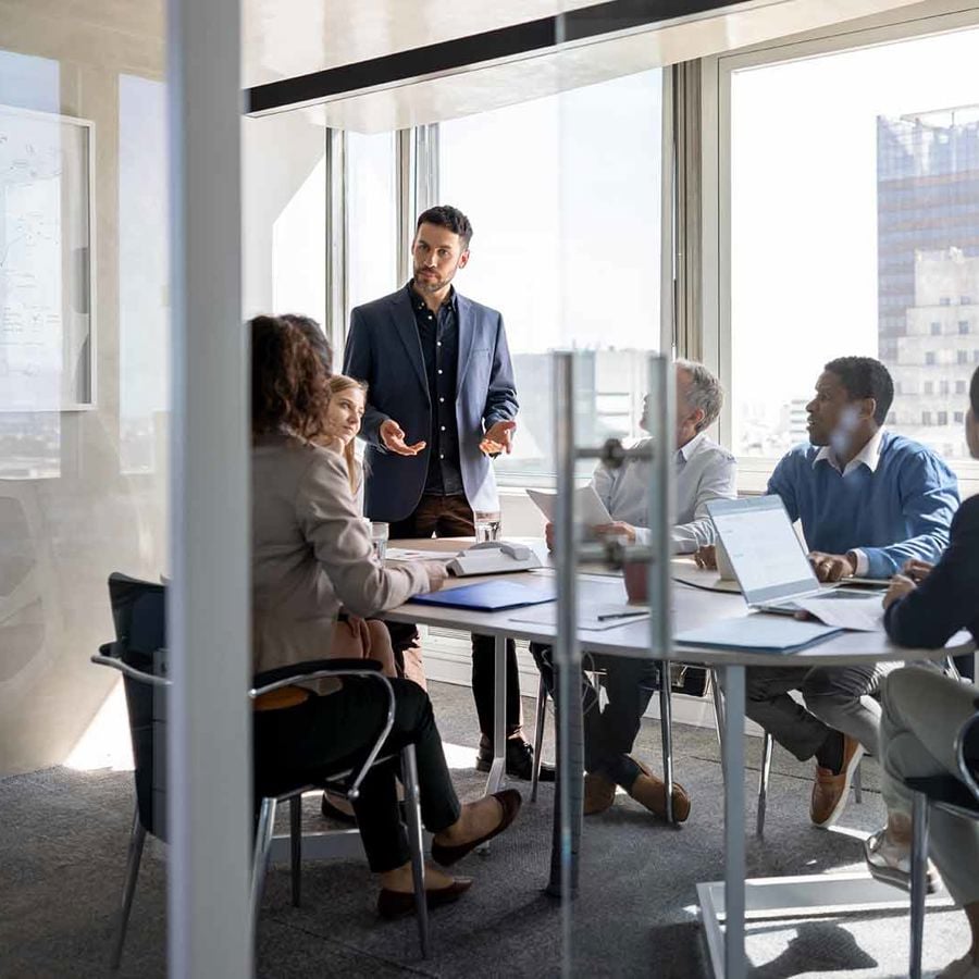 People In Conference Room Discussion 
