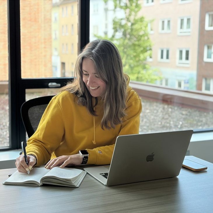Woman Wearing Yellow Writing In Notebook Laptop 
