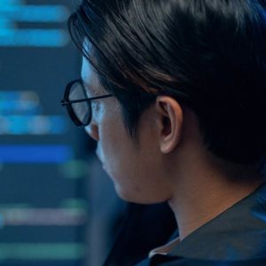 Whitespace Man Working On Computers 