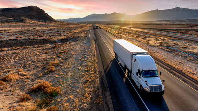 Truck In Vast Desert 
