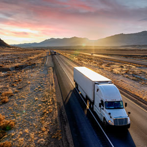 Truck In Vast Desert 