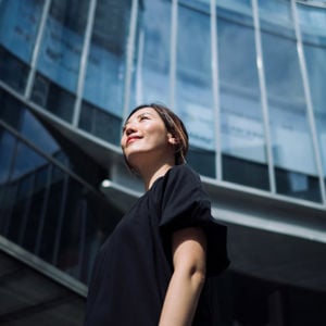 Woman Outside Office Building 