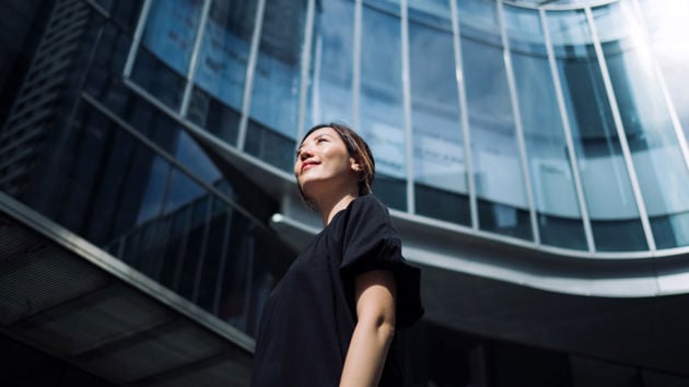 Woman Outside Office Building 