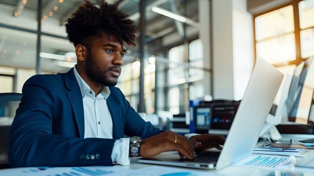 Man Looking At Laptop Screen 