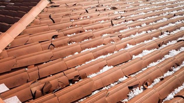 Clay Roof Shingles Damaged By Hail 