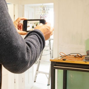 Taking Photos Of Damaged Kitchen 