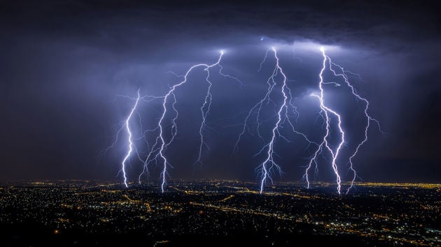 Lightening Storm Over Cityscape 
