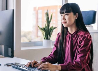 Woman Using Computer 