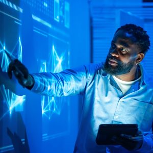 Man Working On Interactive Digital Wall 