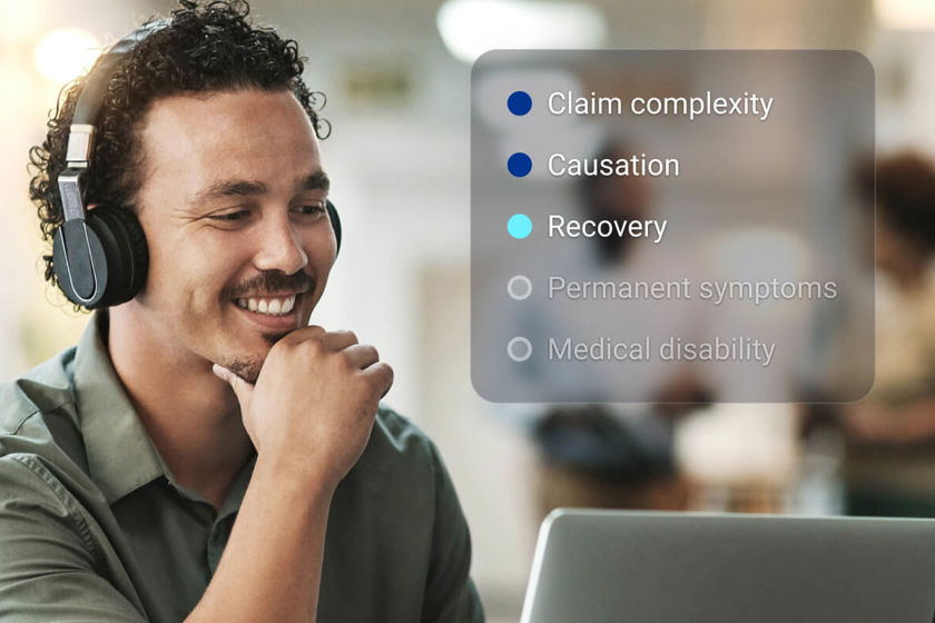 A claims handler wearing headphones smiles while working at a laptop in an office, with an overlay of the medical questions Mavera DSS can support: claim complexity, causation, recovery, permanent symptoms, and medical disability.