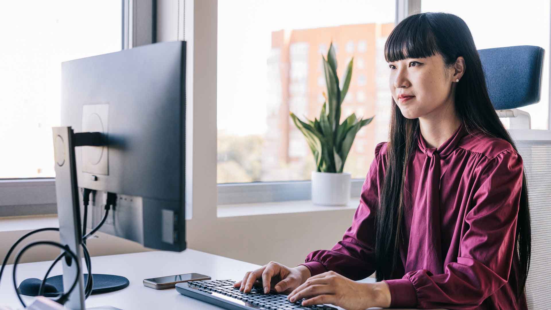 woman using computer