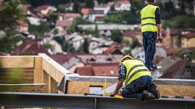Construction Workers On Building 