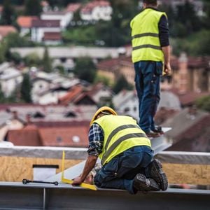 Construction Workers On Building 