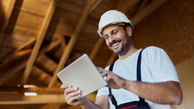 Construction Worker Using Tablet 