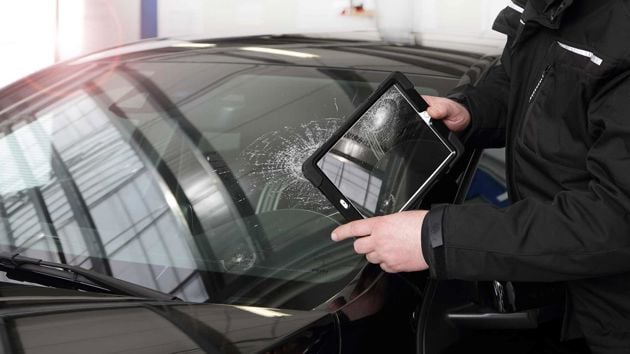 Documenting Windshield Damage With Tablet 