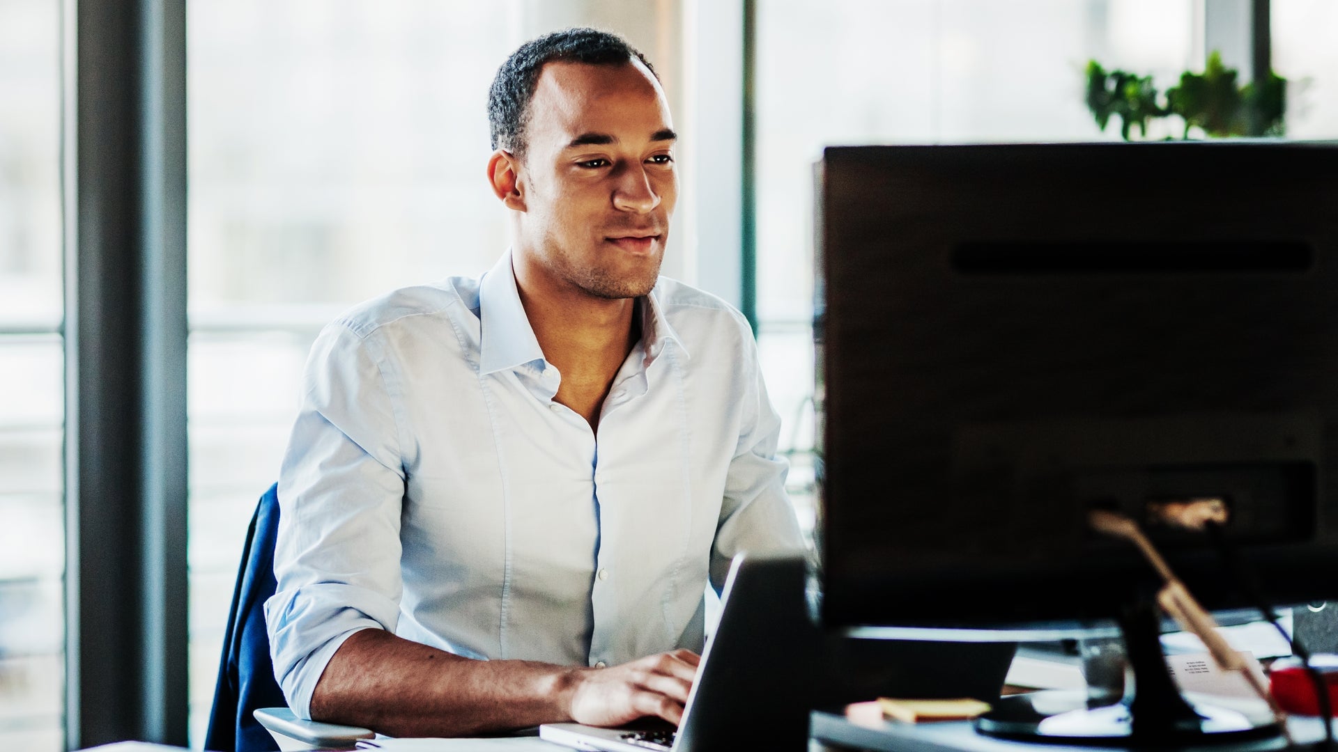 man checking his computer